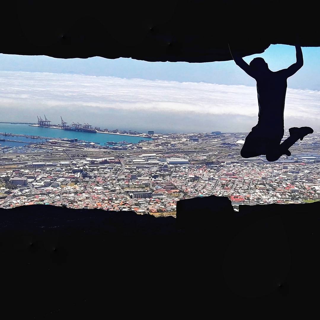Showing off in Woodstock Cave on Table Mountain. 